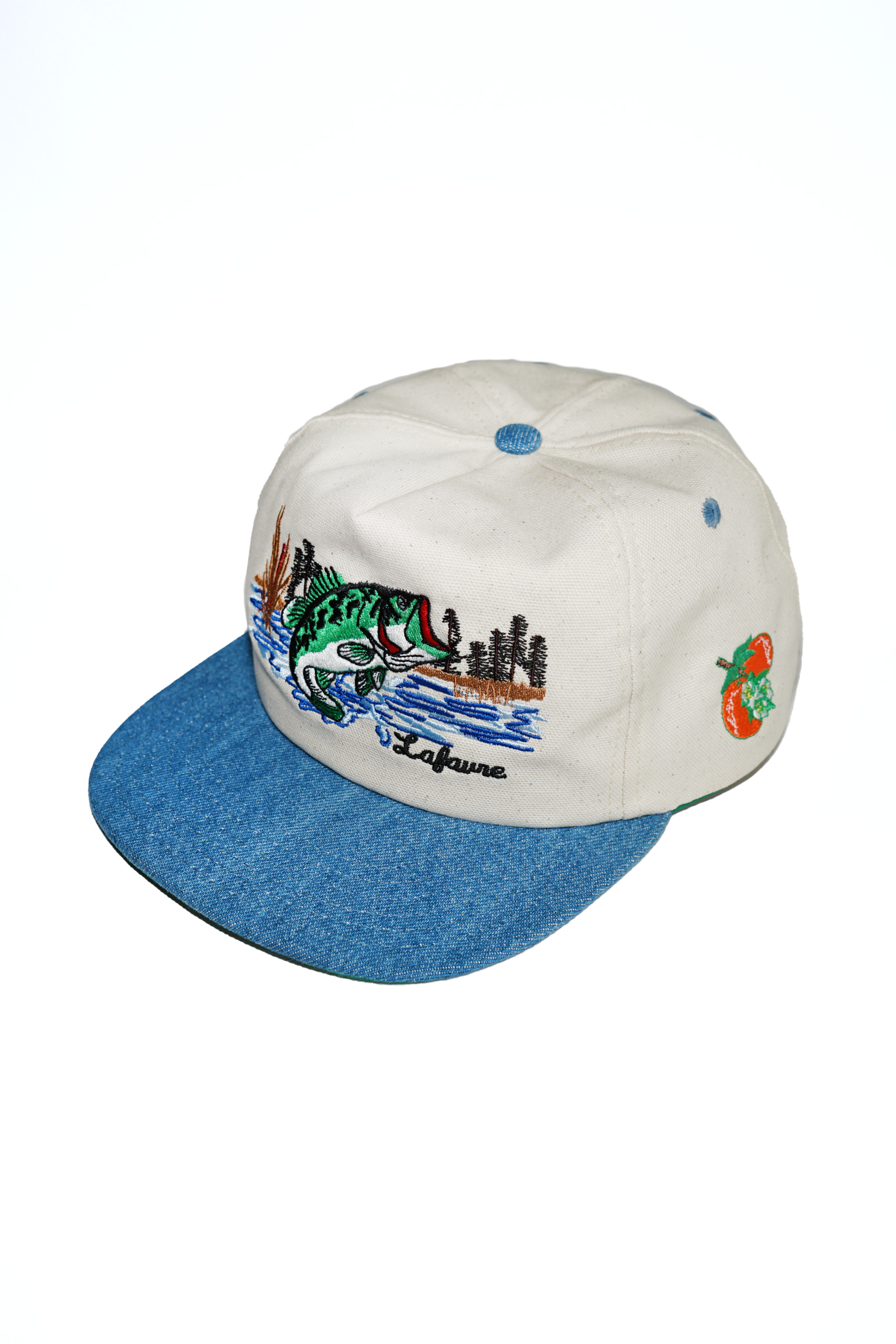 Cap with blue brim and colorful design on a white background