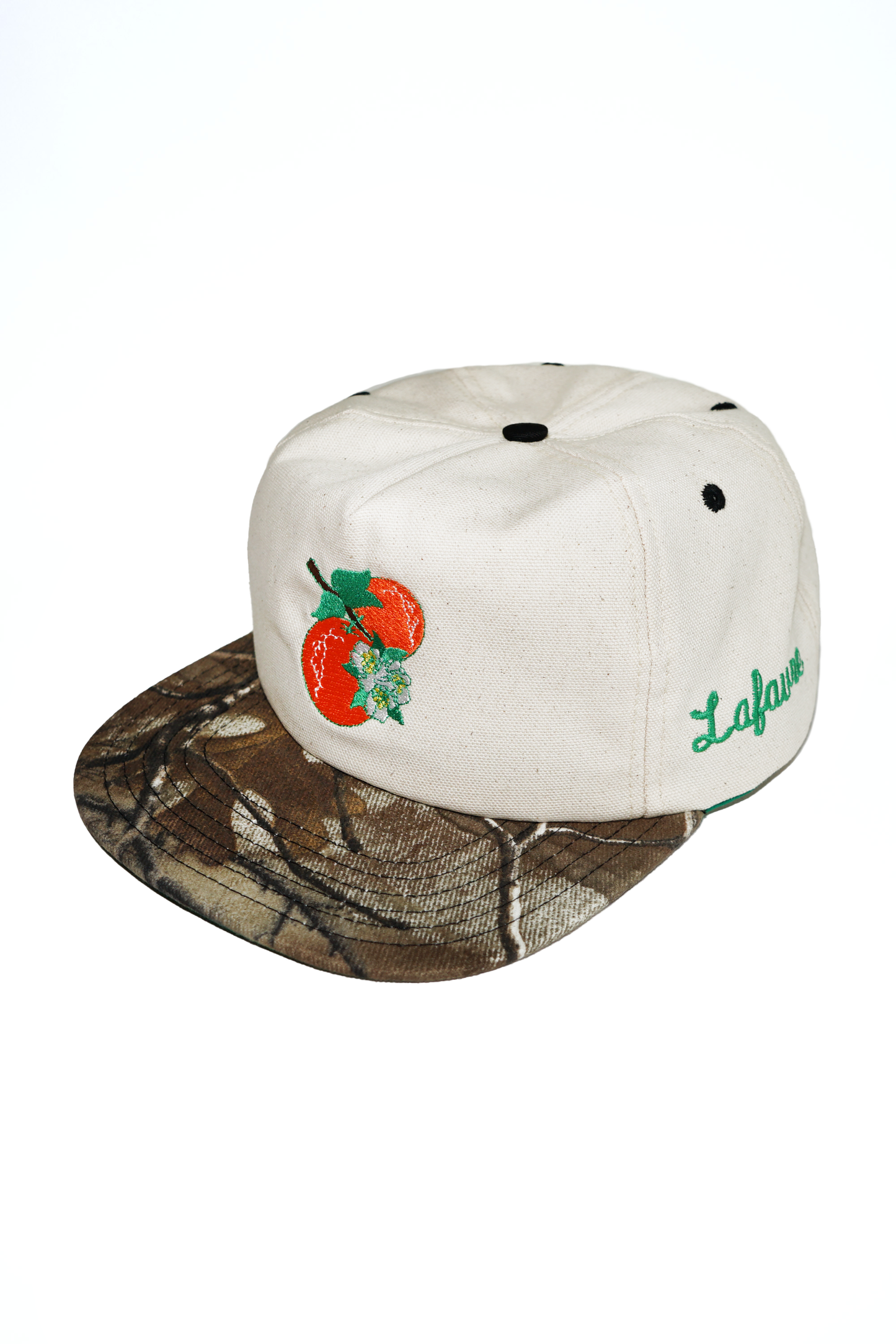 A hat with camo visor on a white background