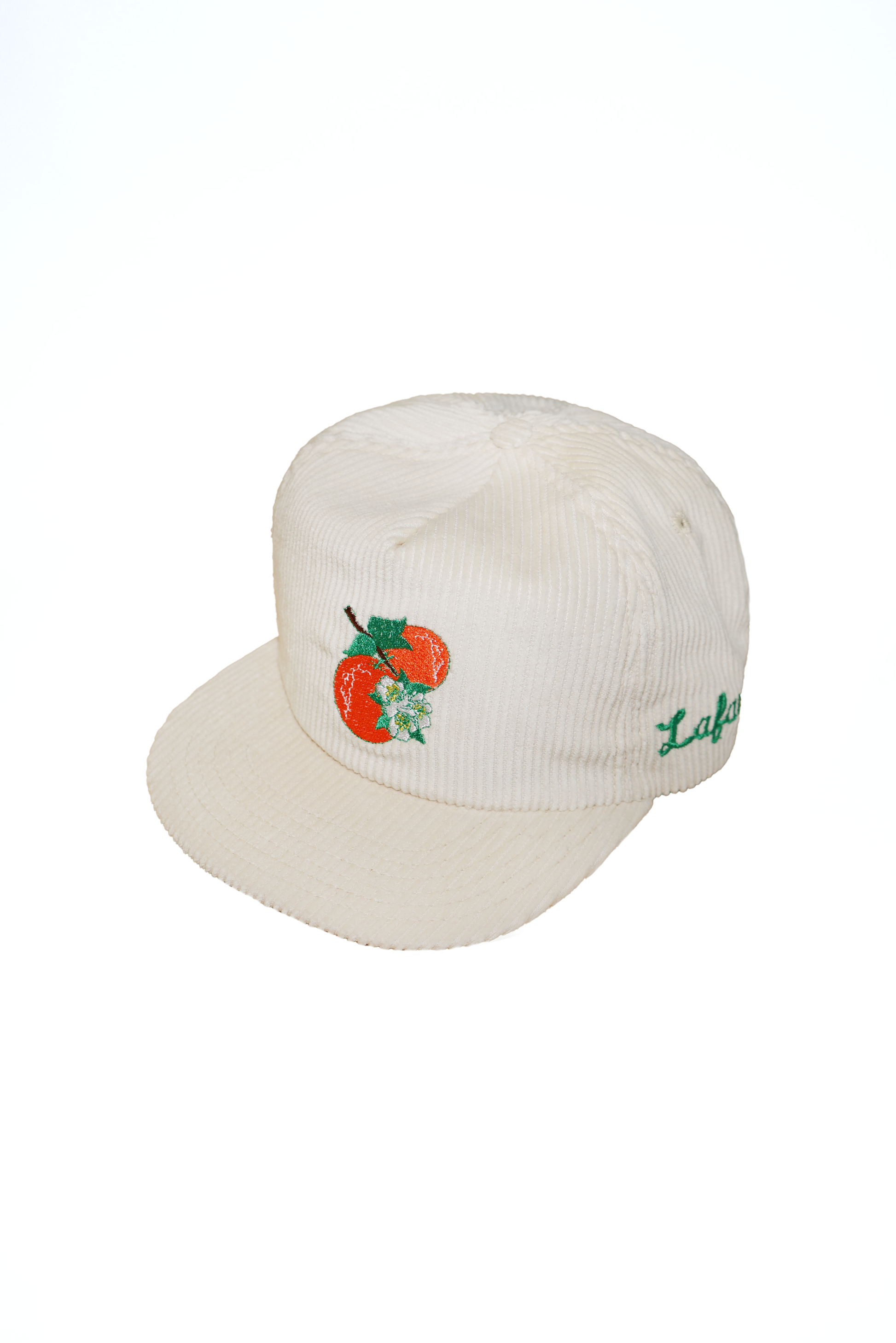 White cap with embroidered design on a white background