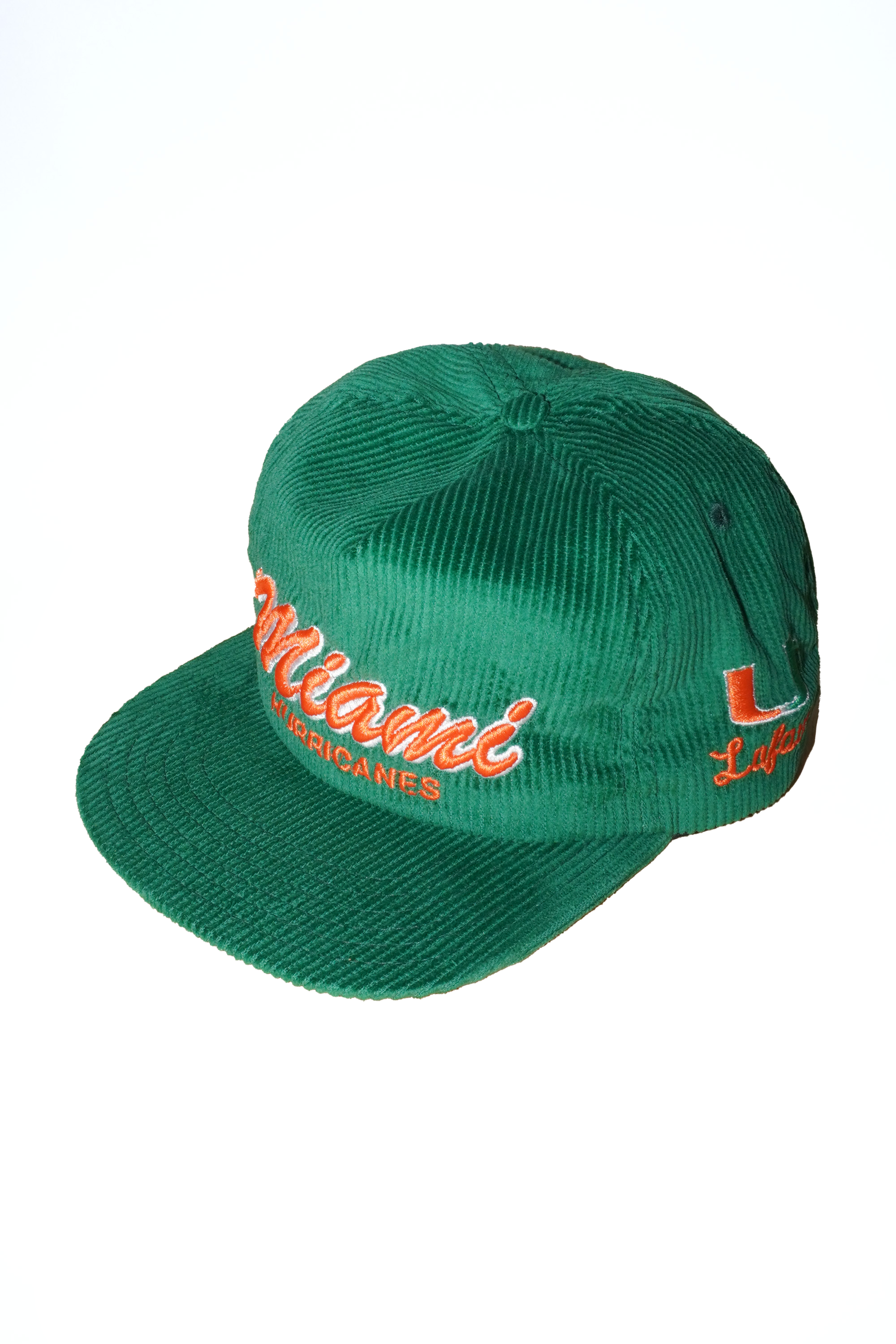Green corduroy cap with 'Miami Hurricanes' text on a white background