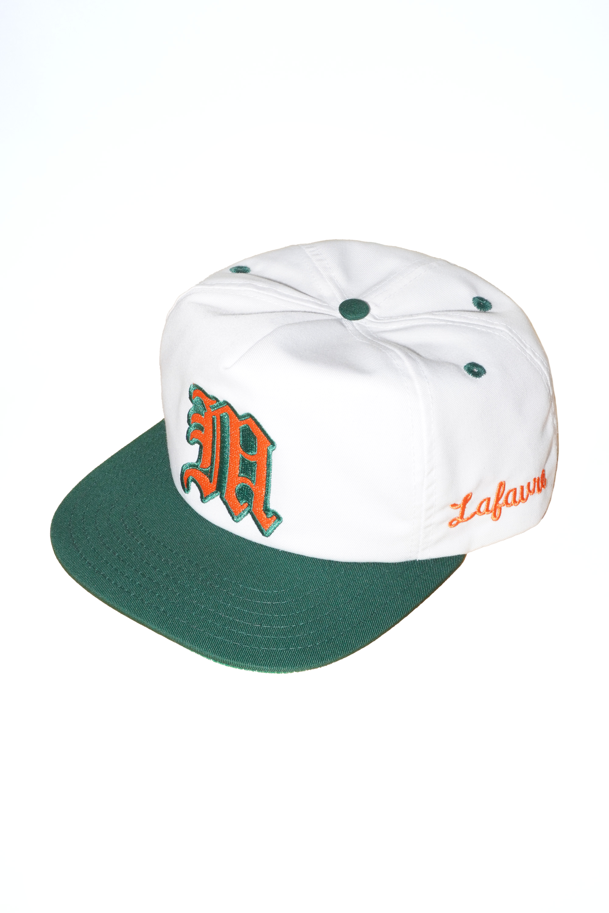 White and green cap with red and orange text on a white background