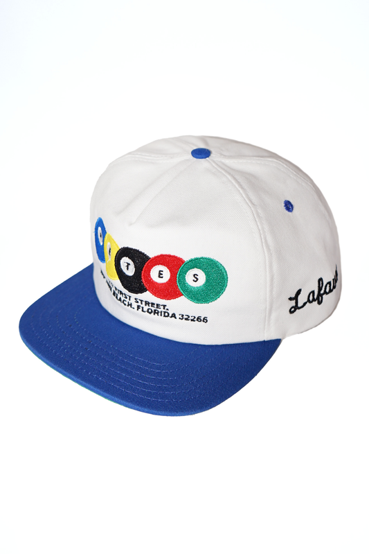 White cap with blue brim and colorful logo on a white background